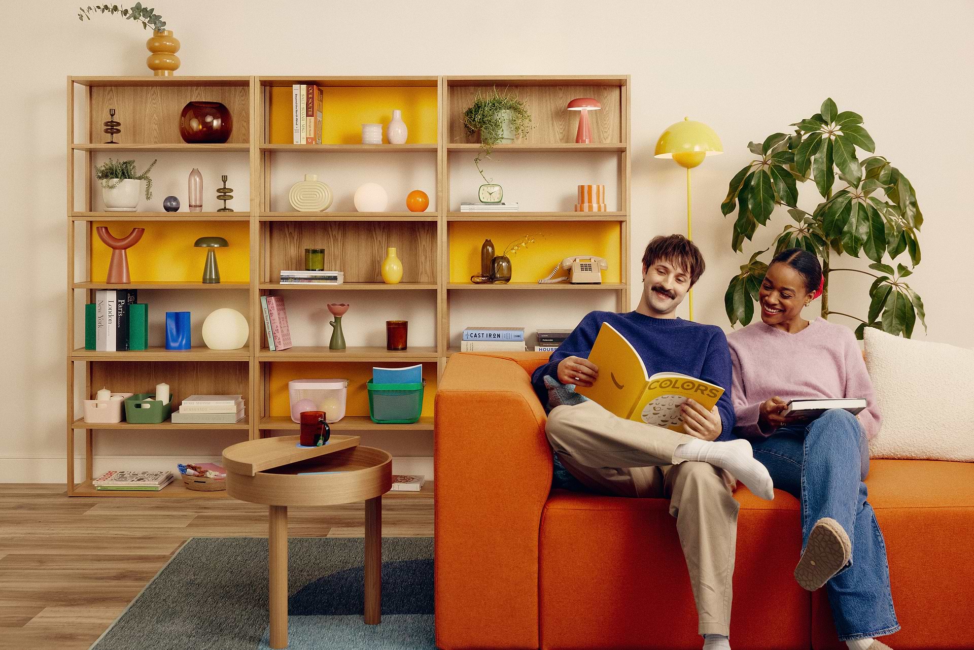 Two people sitting in a living room