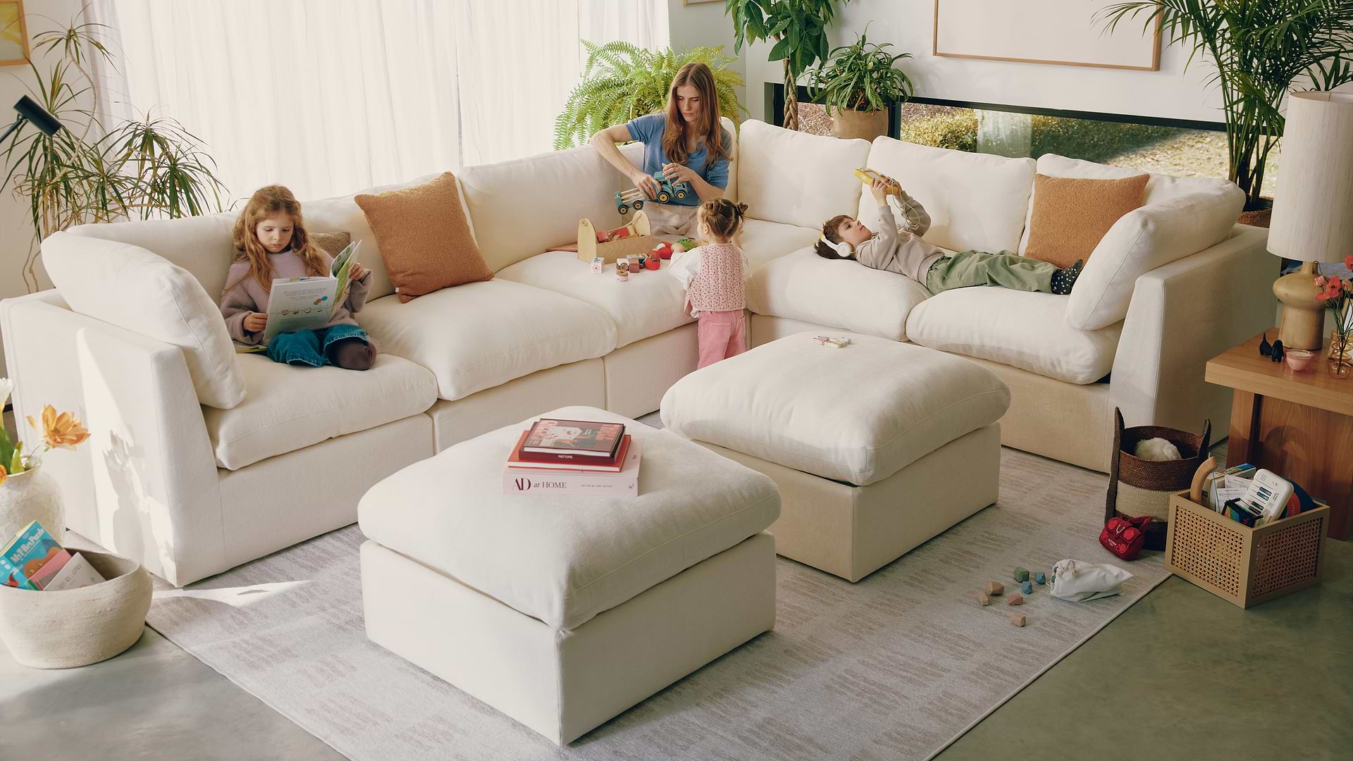 Family on a white sectional sofa