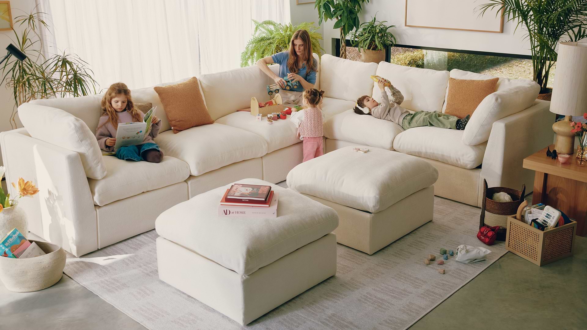 Family on a white sectional sofa
