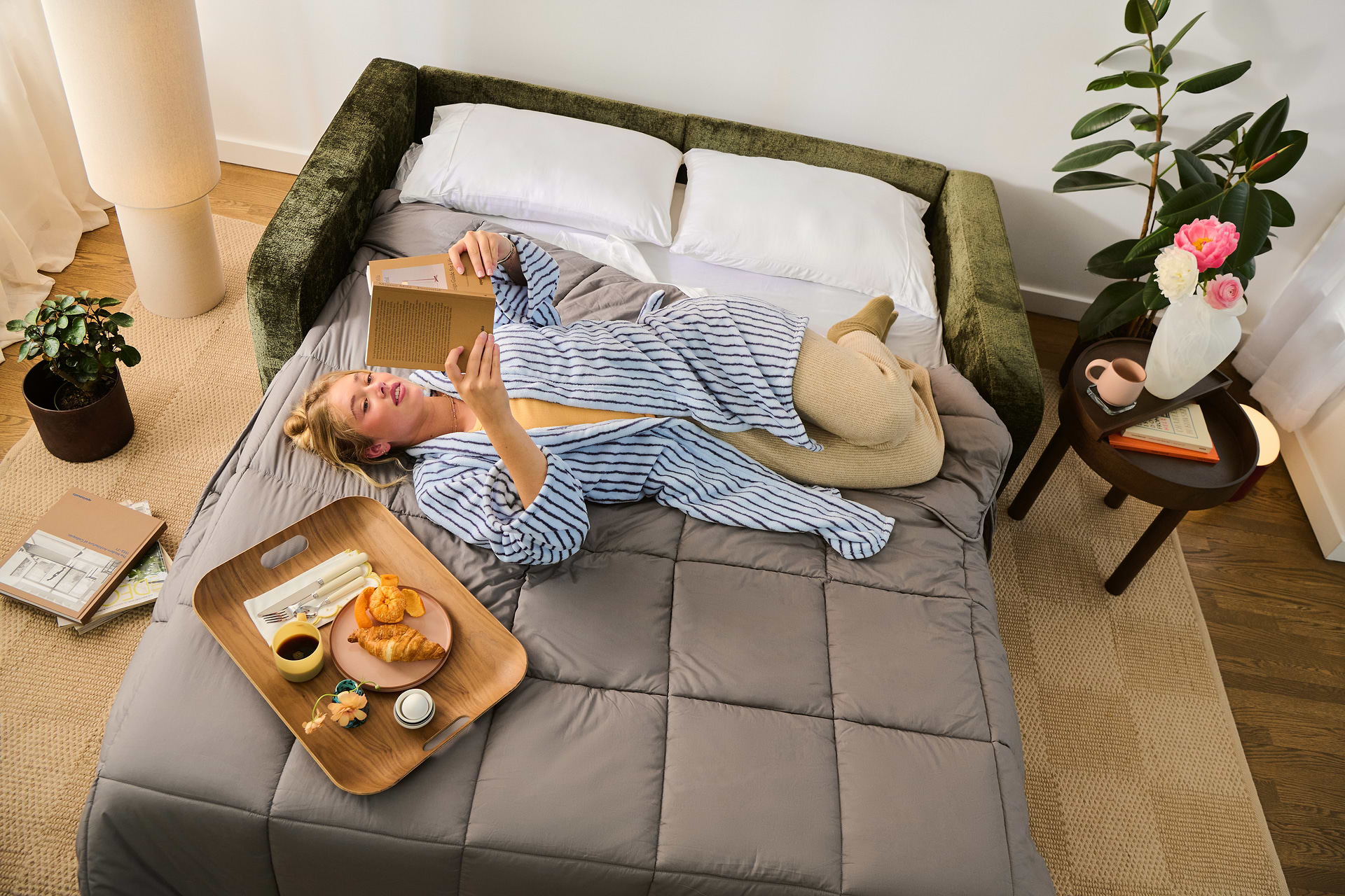 Woman on sofa bed