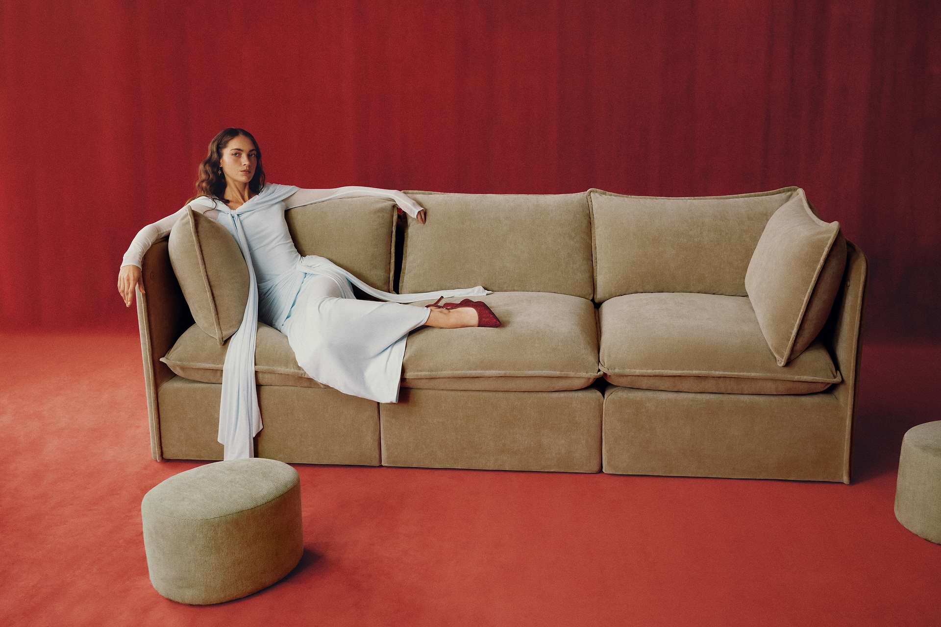 Woman on a beige sofa