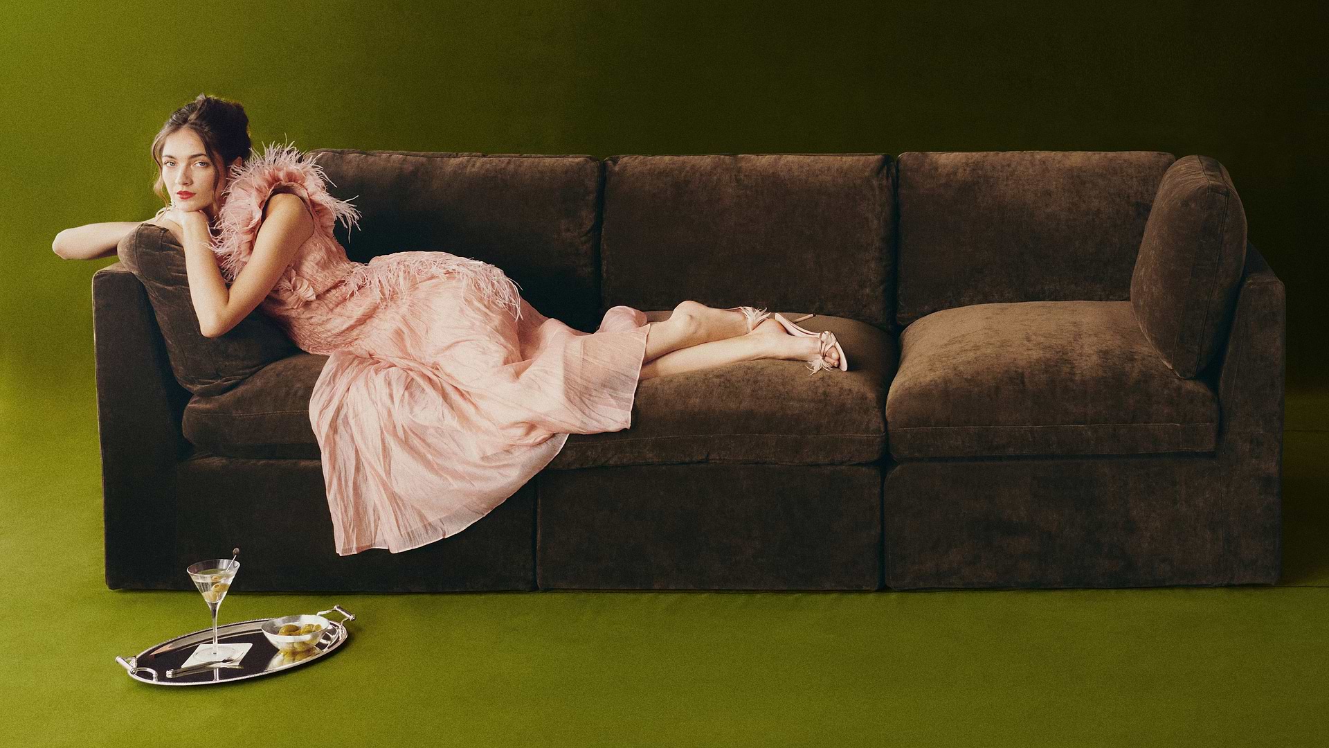 Woman on a brown sofa